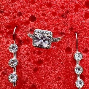 Silver and White Diamond Ring with Halo Design